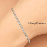 4.25ctw Round Brilliant Diamond Eternity Tennis Bracelet set in 14k Yellow Gold